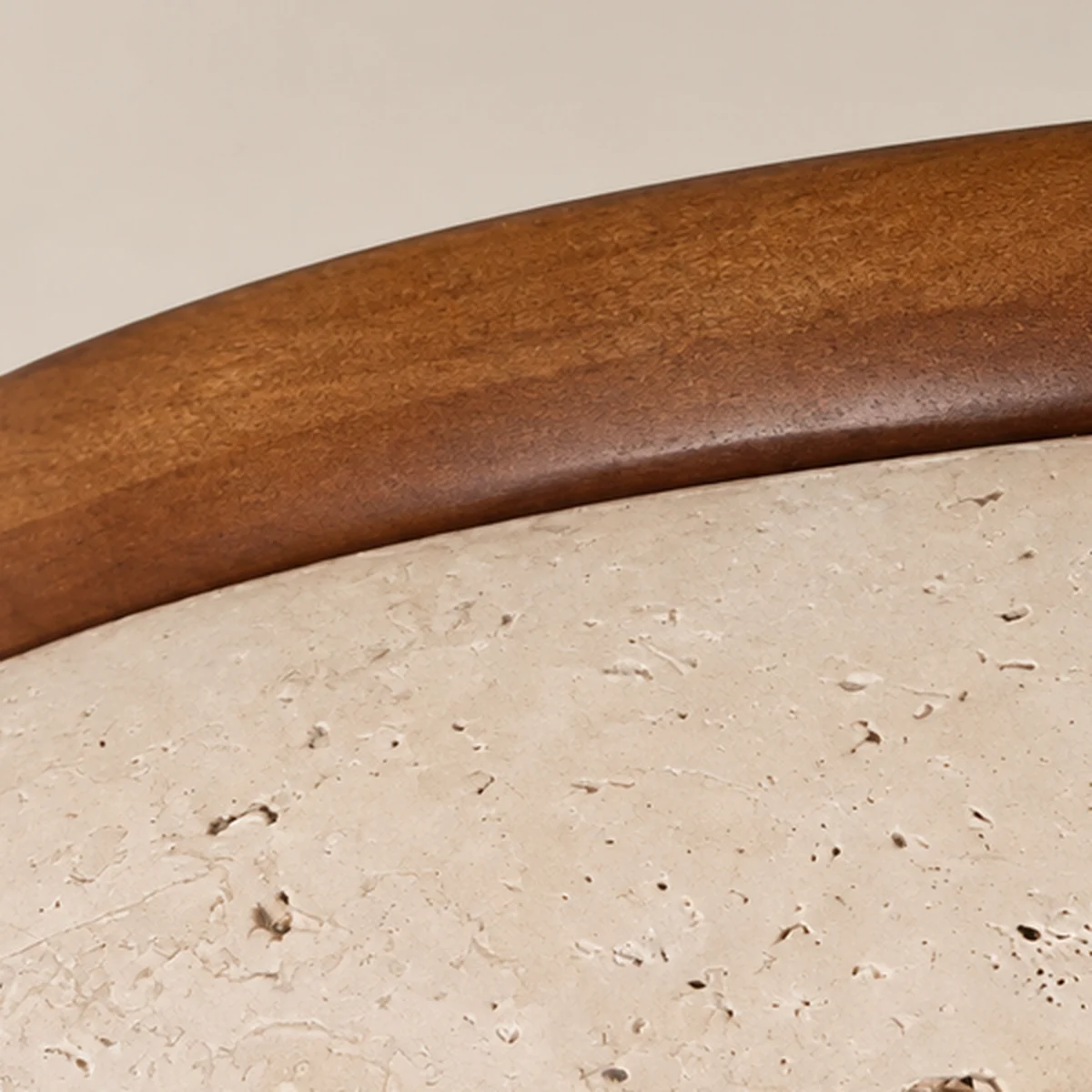 Close view of the walnut ring above the travertine shade