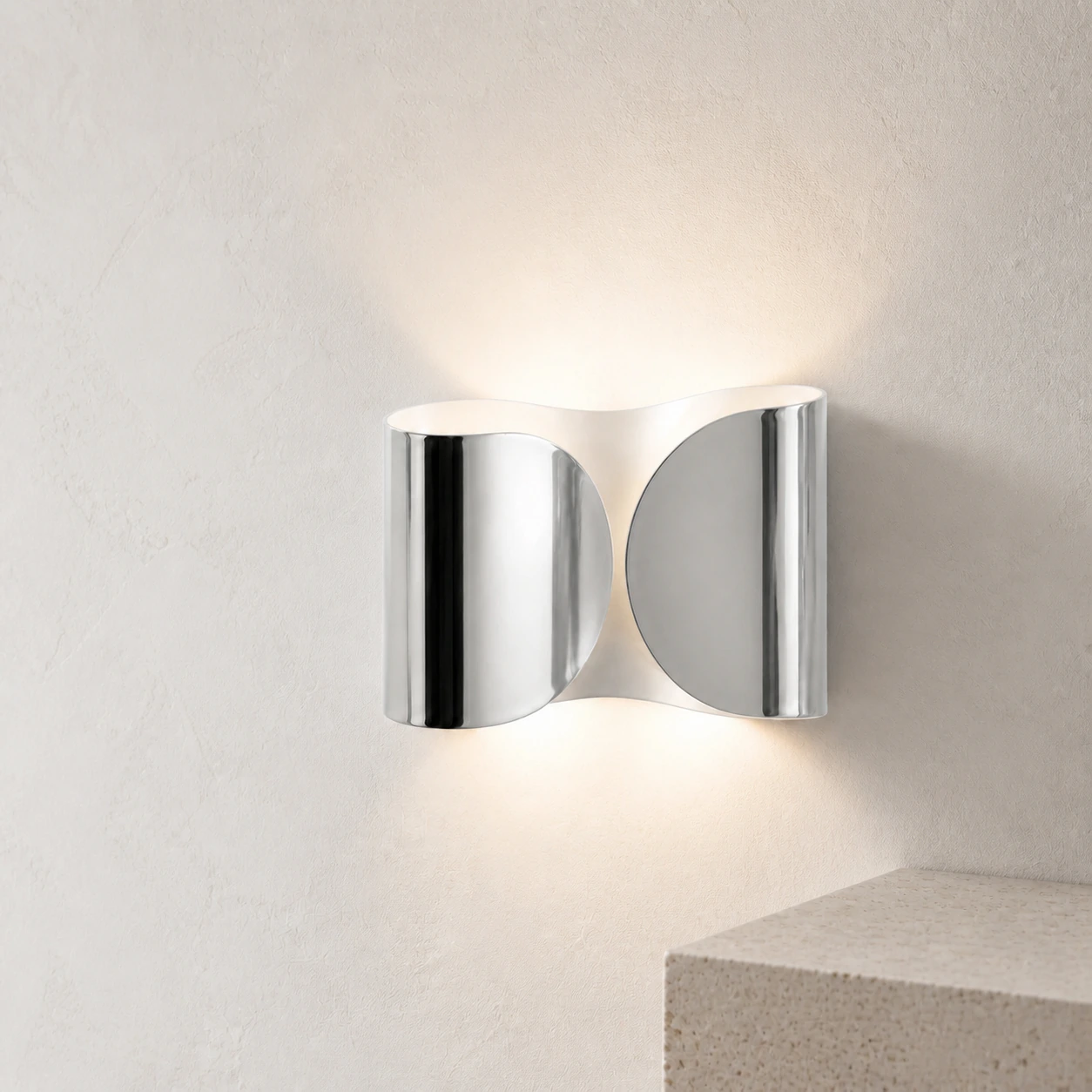 Chrome Foglio Wall Lamp on a pale gallery wall