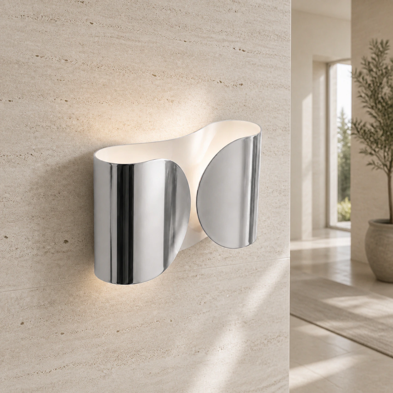 Chrome Foglio Wall Lamp casting light upward and downward