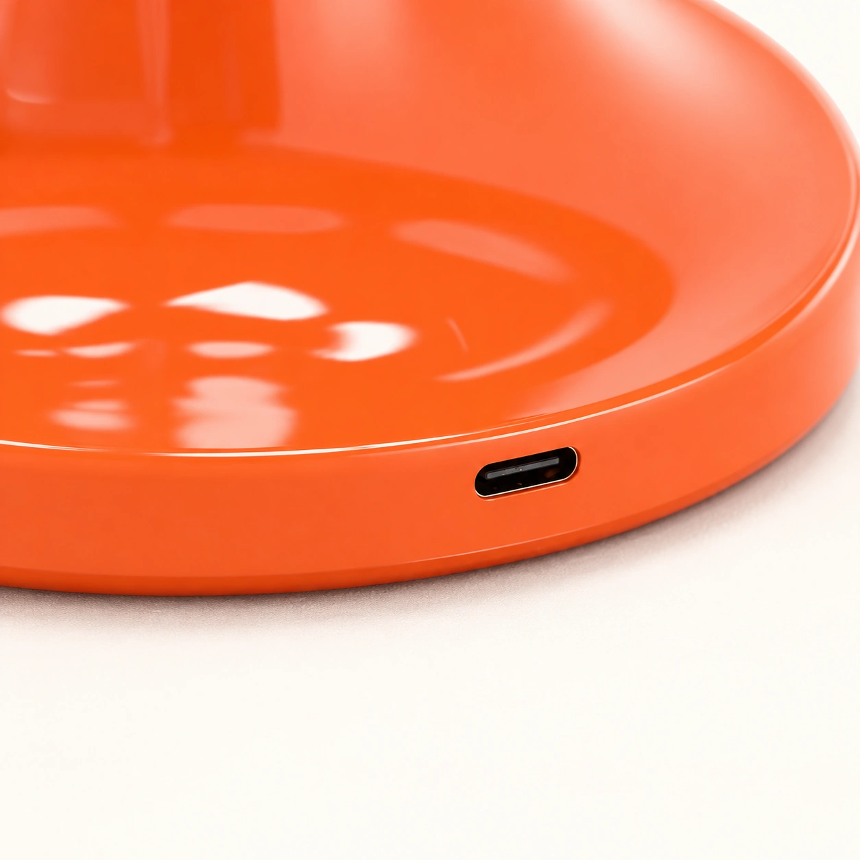 USB-C charging port on the orange mushroom lamp base
