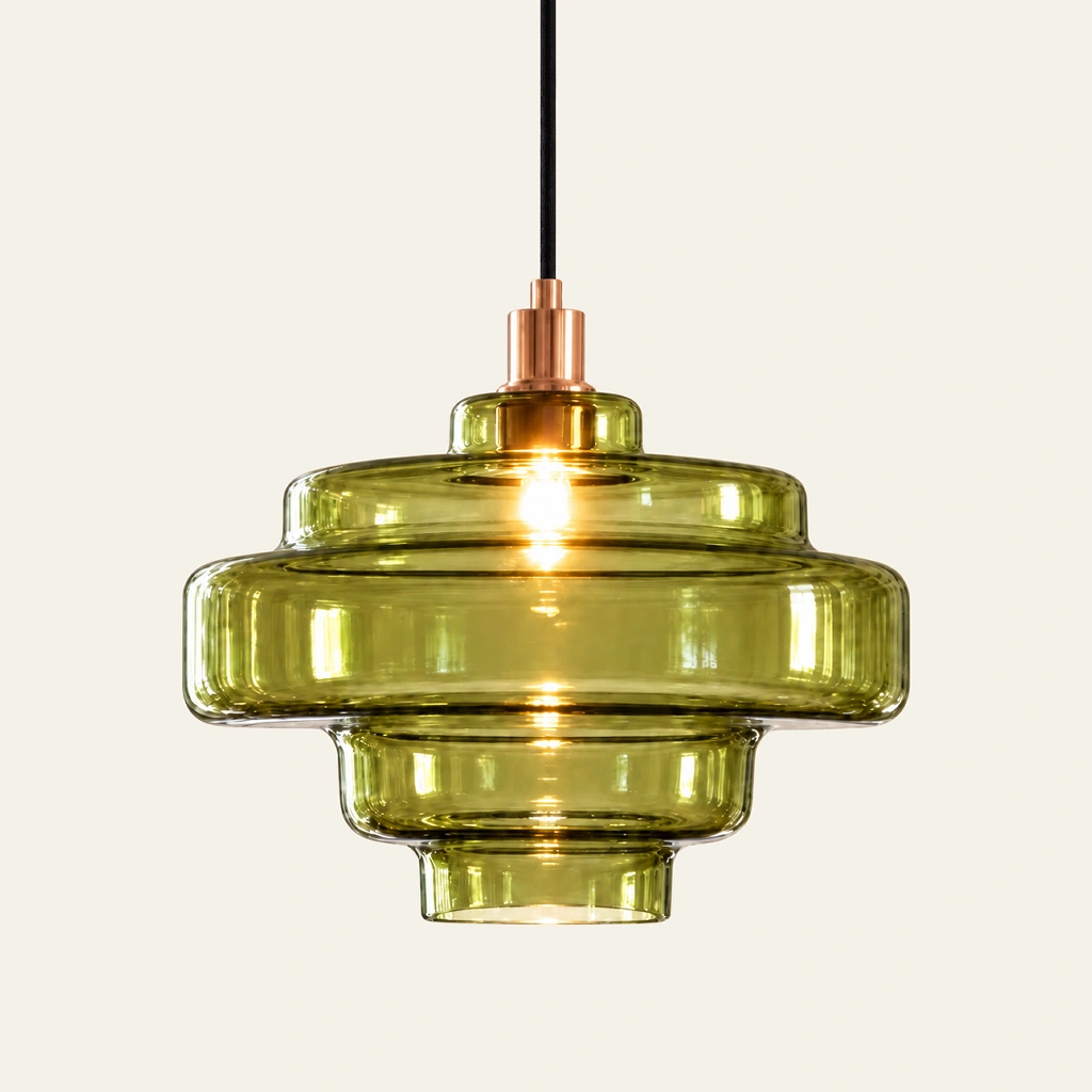 Mirelle pendant light in Green, metal connector, on an ivory background