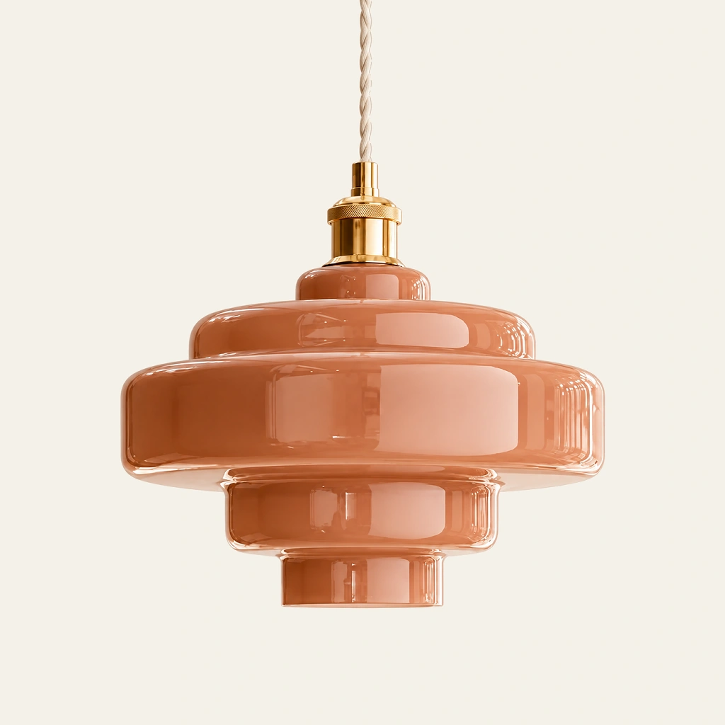 Mirelle pendant light in Rose Pink, metal connector, on an ivory background