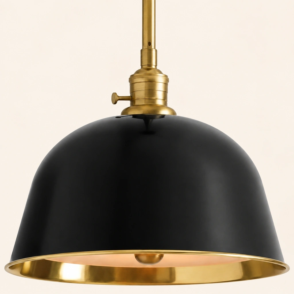 Close view of the black Ellis shade shoulder and brass-tone rod connection