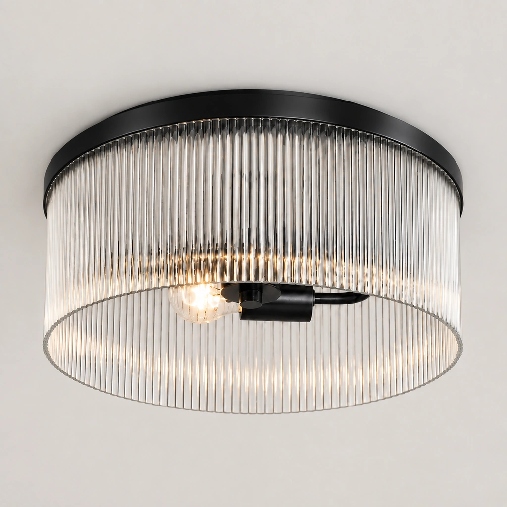 Black Vesper flush mount with ribbed glass drum on a plain background