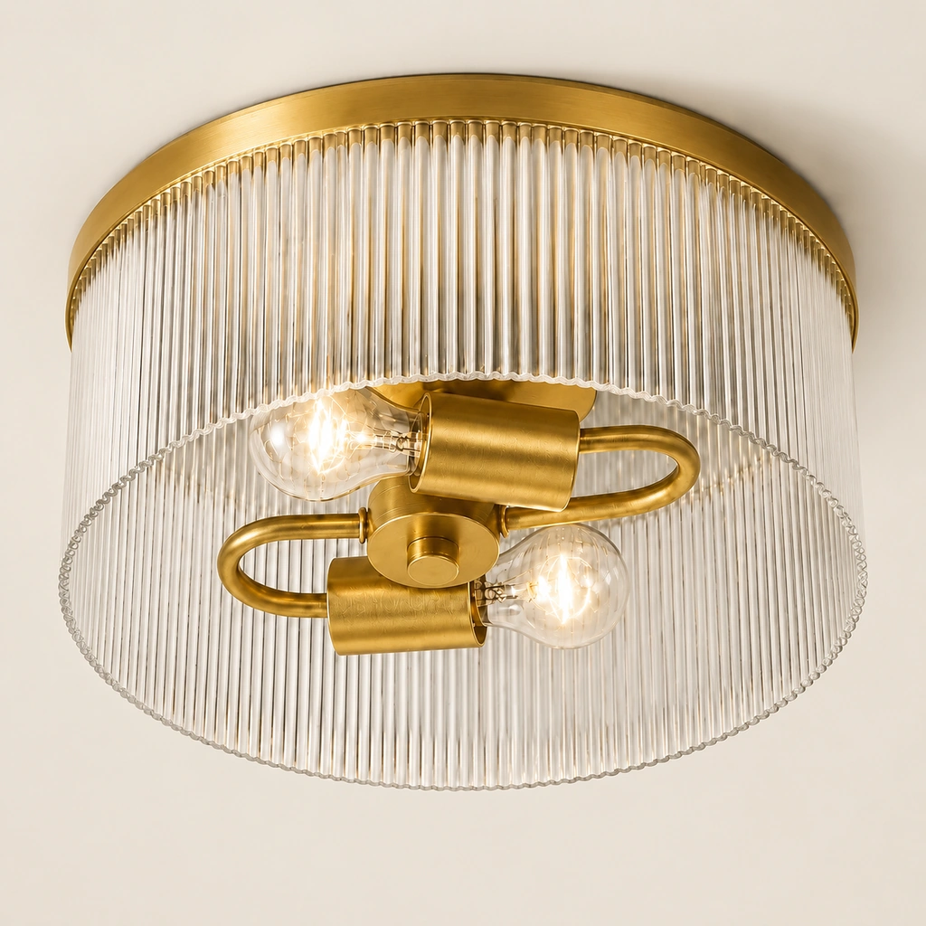 Underside of Tumbled Brass Vesper showing two exposed bulbs and curved brass arms