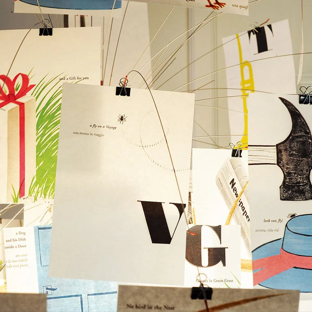 Close view of Zettel’z pendant light cards, clips and fine wires