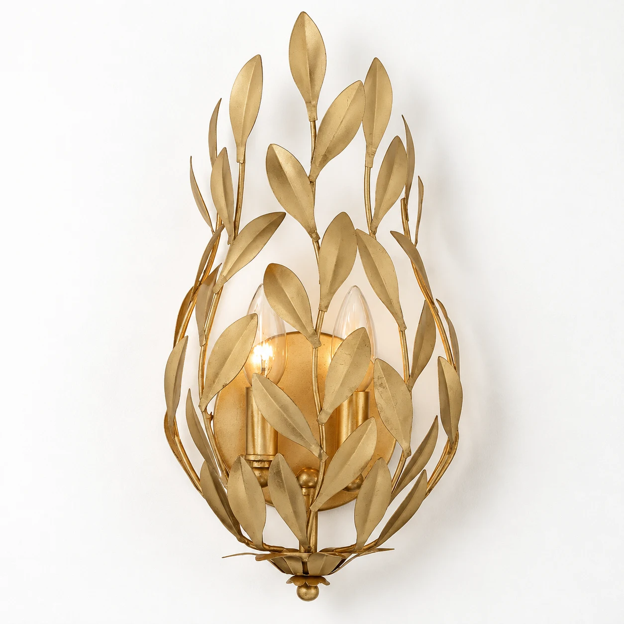 Elise leaf-branch iron wall sconce in gold leaf finish on white