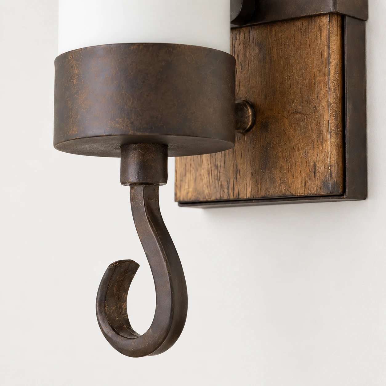 Curved aged metal lower hook detail