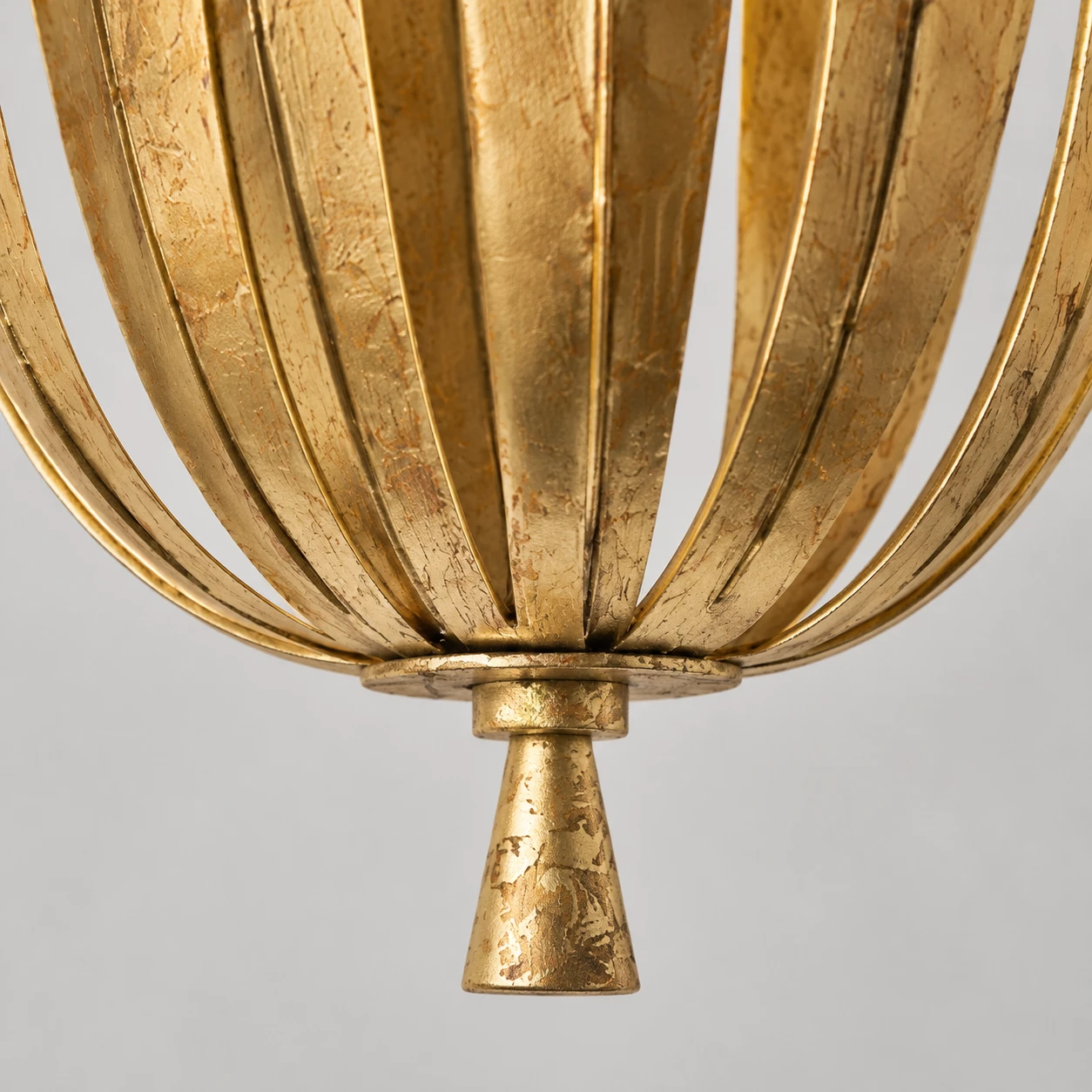Gold-leaf lower joint and finial detail