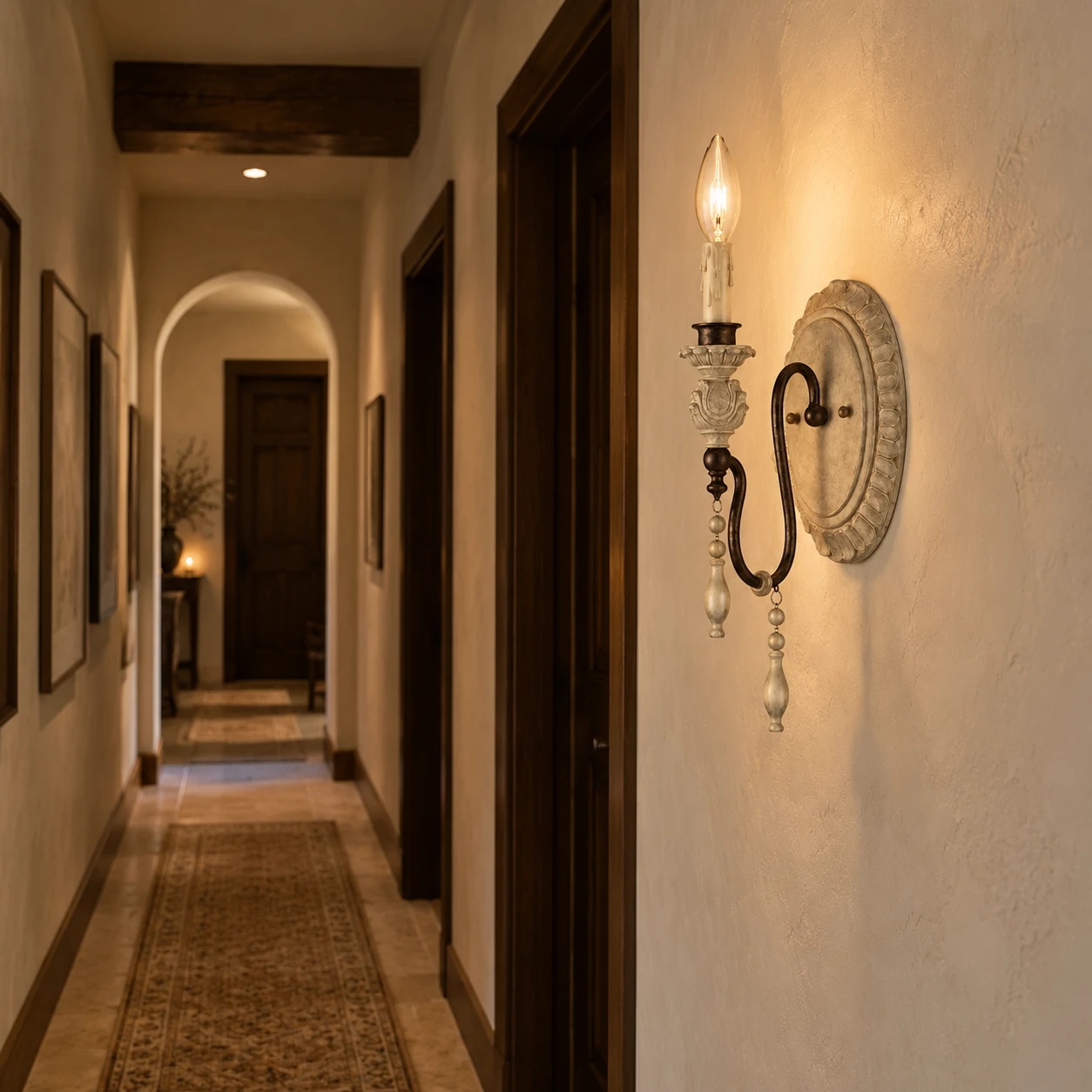 Pair of one-light wall sconces in a hallway
