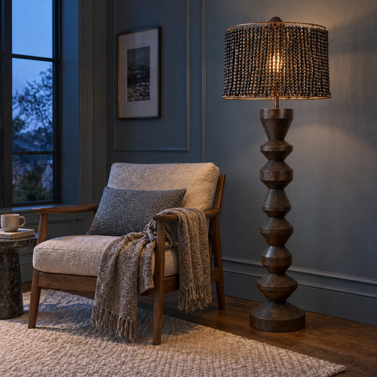 Dark wood beaded floor lamp at blue hour