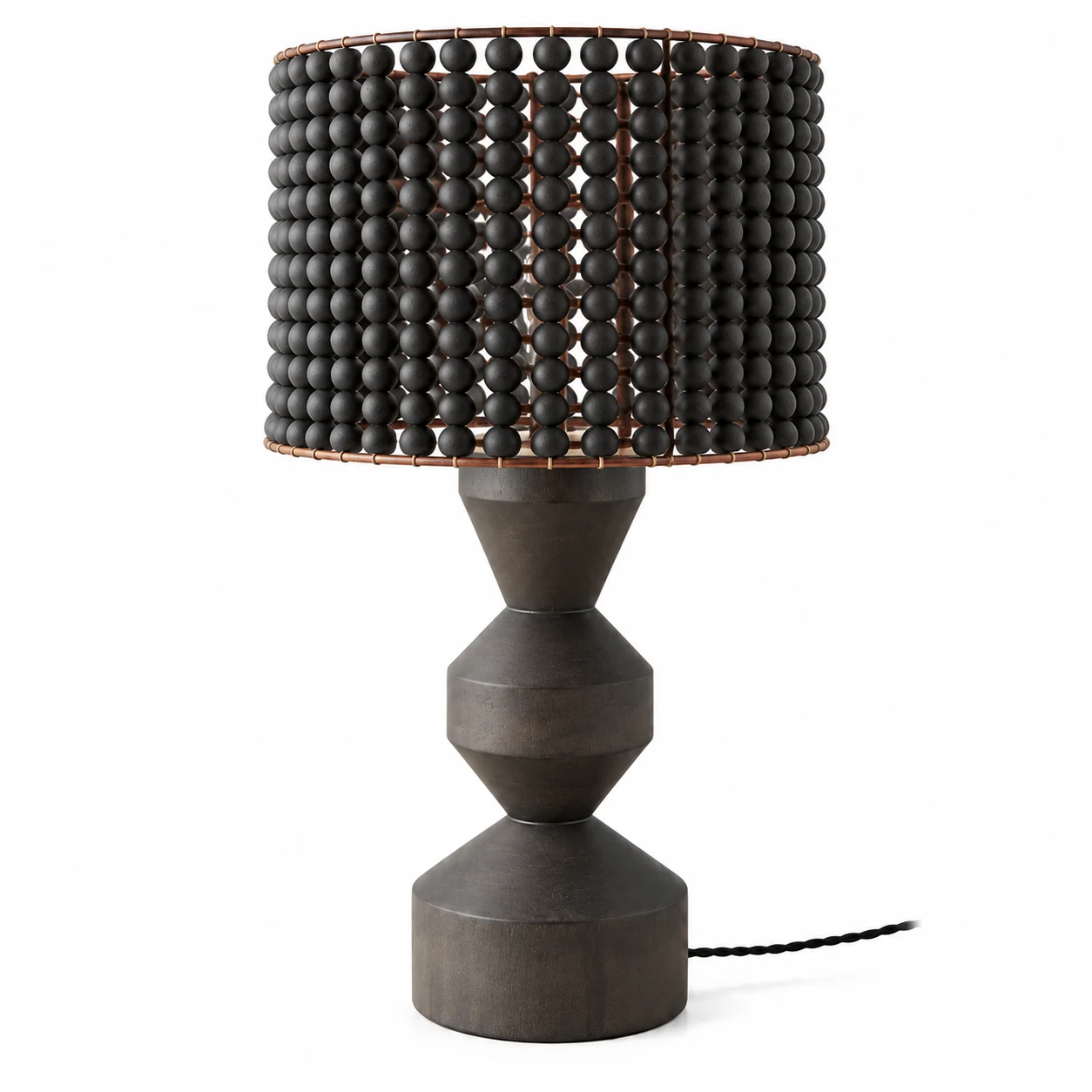 Three-quarter view of the dark wood beaded table lamp