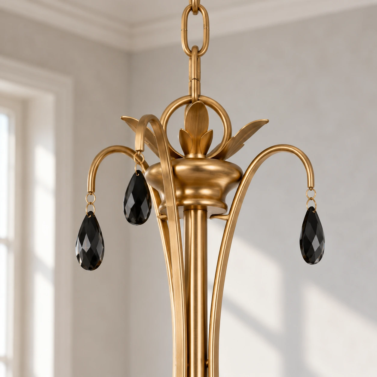 Close view of the Celeste chandelier crown and black crystal drop