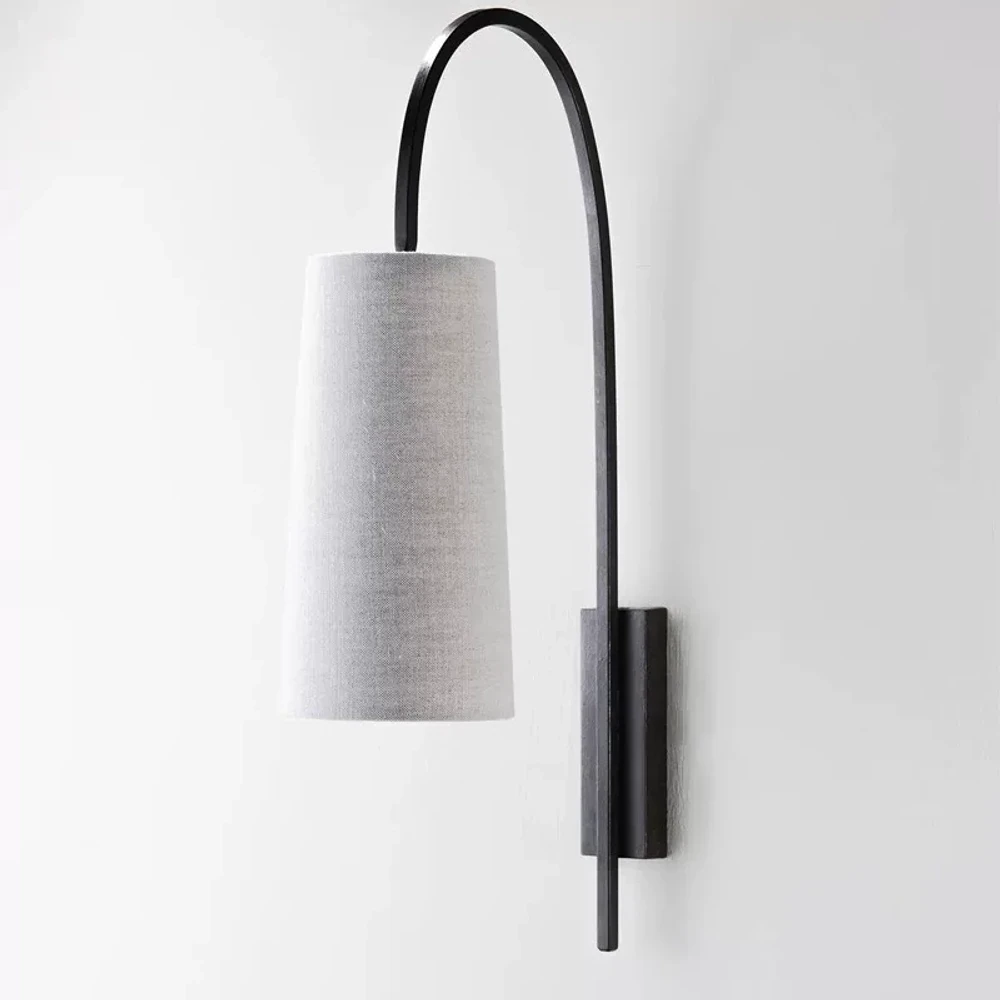 Black Iron fabric wall sconce on a white background