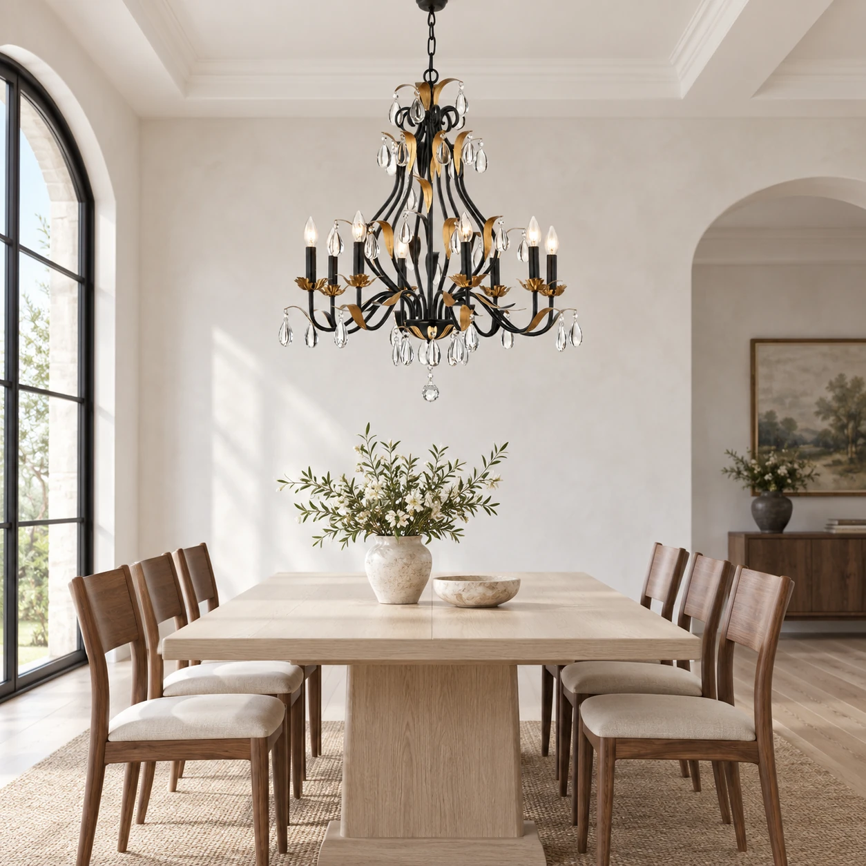 Vintage black and gold crystal chandelier above a dining table