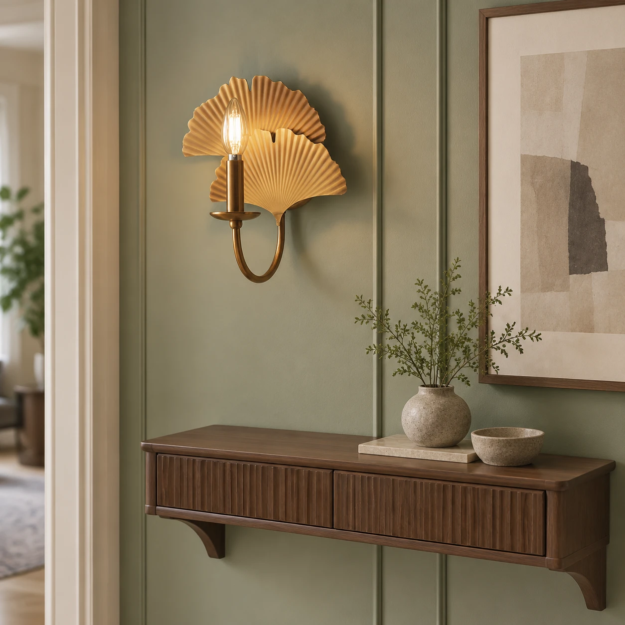 Exposed-bulb ginkgo wall sconce in a residential hallway