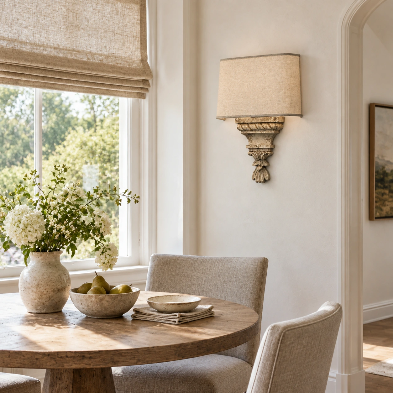 Amelie French country wall sconce in a dining alcove