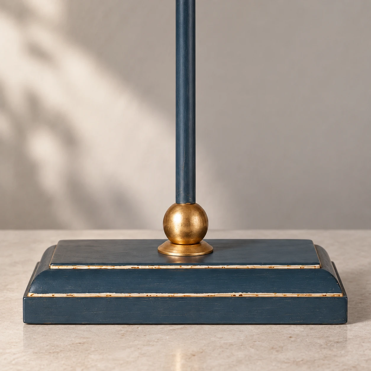 Blue stepped base and gold stem collar detail