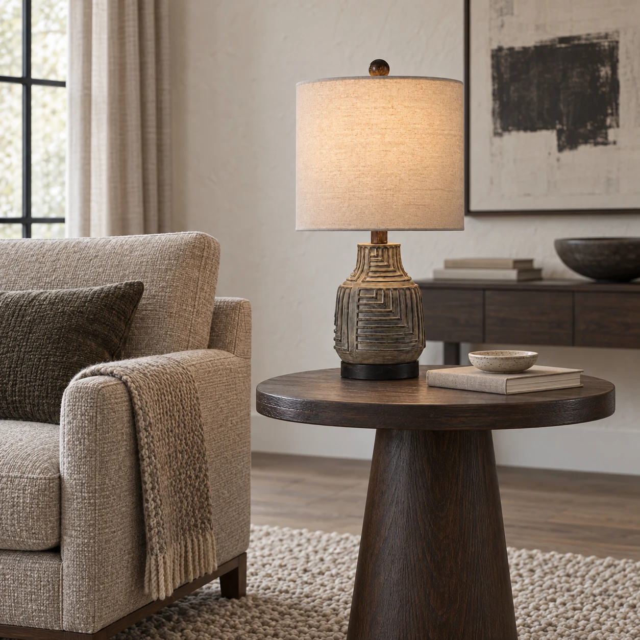 Carved wood table lamp on a hotel lounge table