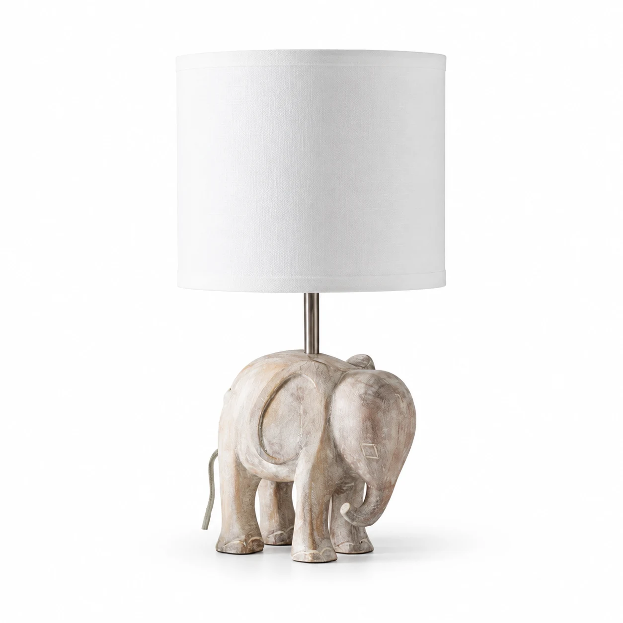 Elephant carved wood table lamp on a white background