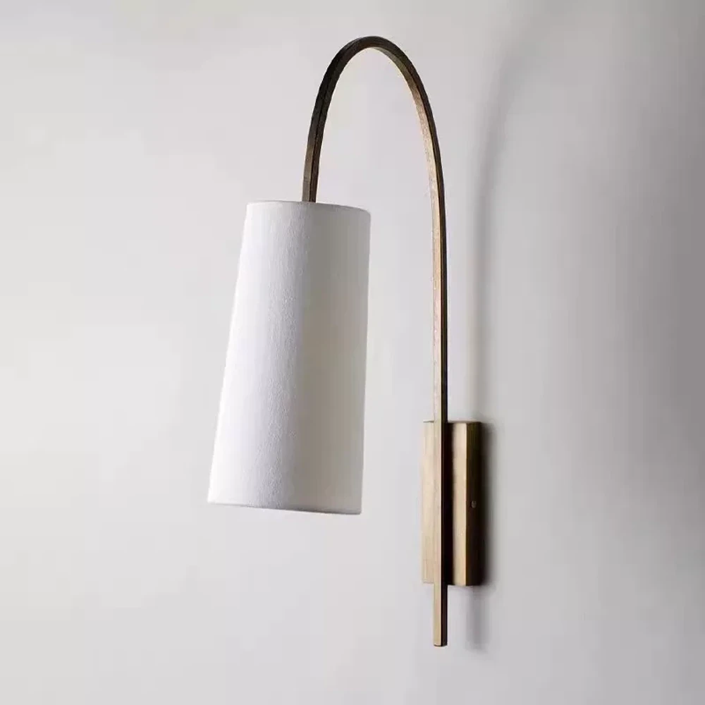 Antique Gold fabric wall sconce on a white background
