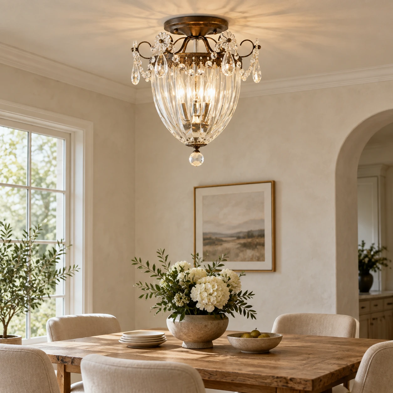 American Rustic Crystal Chandelier in a compact dining room above a timber table with pale mineral plaster