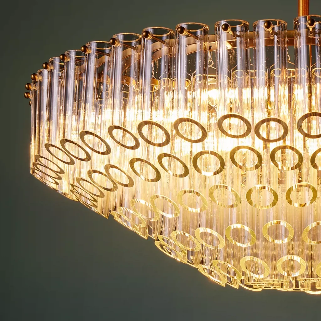 Camille chandelier glass tubes illuminated with warm light