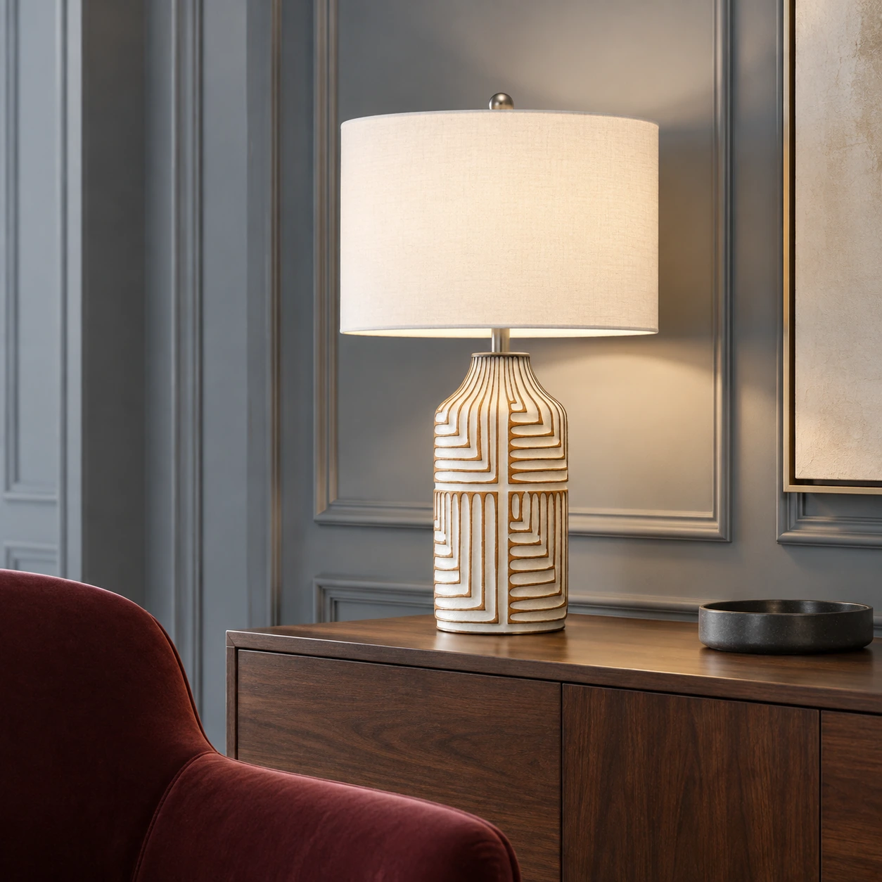 Odette table lamp in a smoke-blue boutique hotel lounge with a burgundy chair