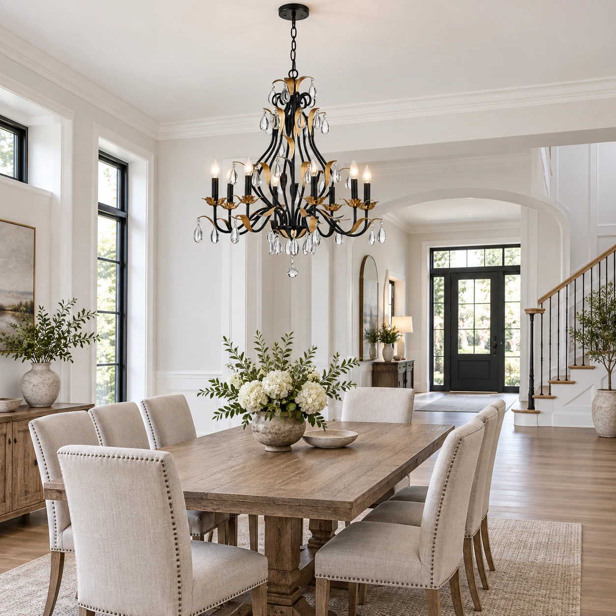 Wide architectural interior with a black and gold crystal chandelier