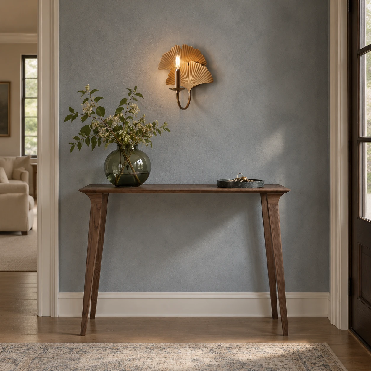 Elodie vintage copper ginkgo wall sconce in an entryway