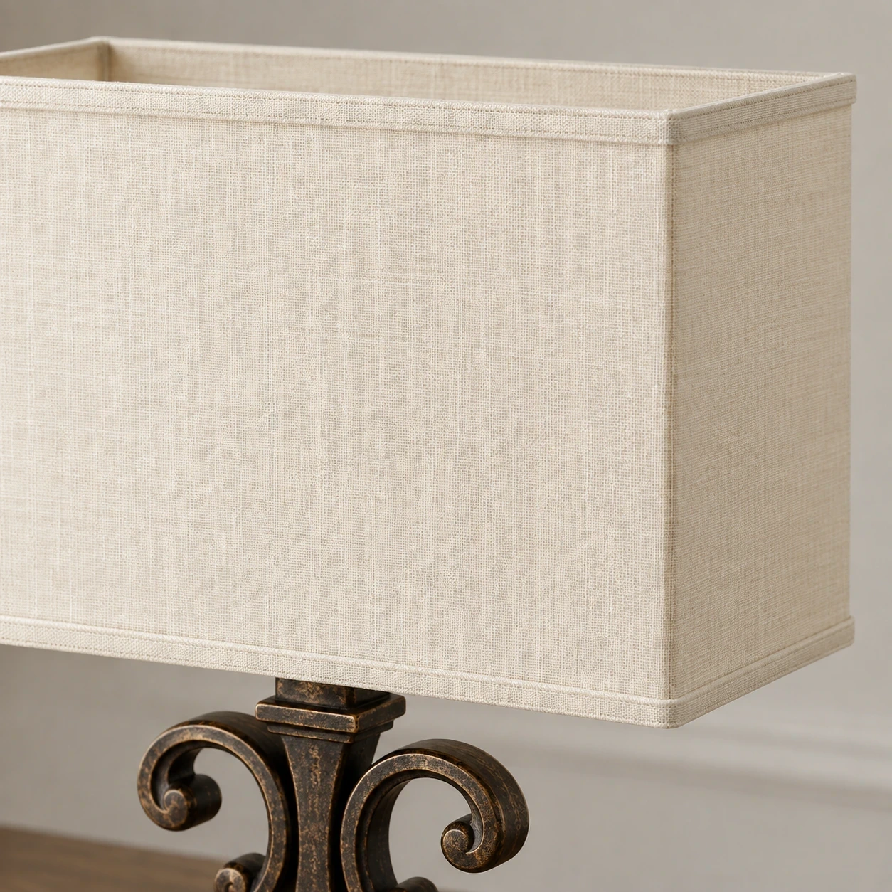 Close detail of the ivory fabric shade and tailored trim