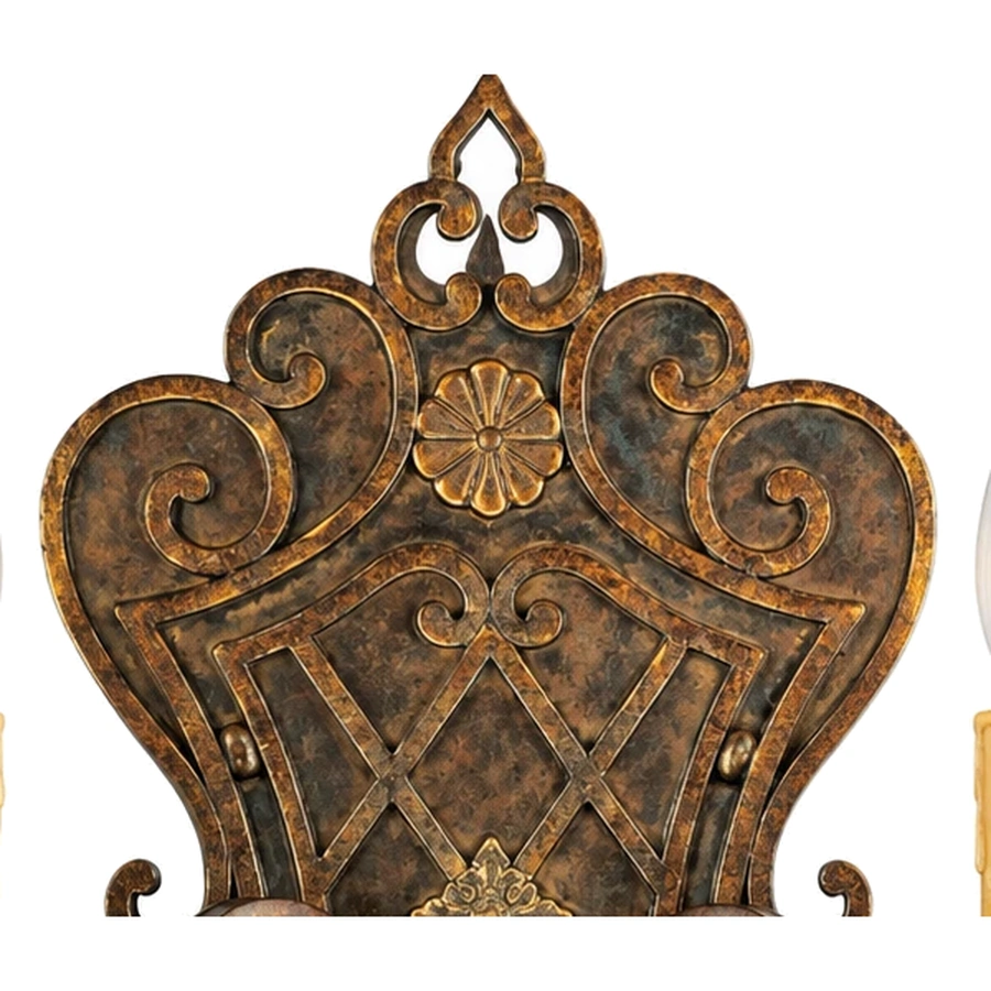 Ornate iron backplate and raised scrollwork