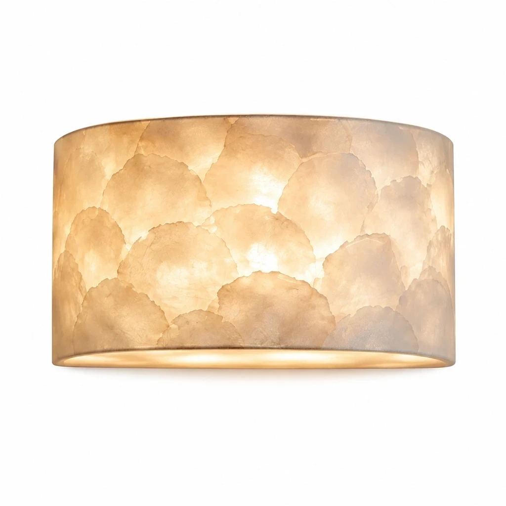 Close detail of Odette Vintage Layered Shell Iron Wall Sconce light behavior