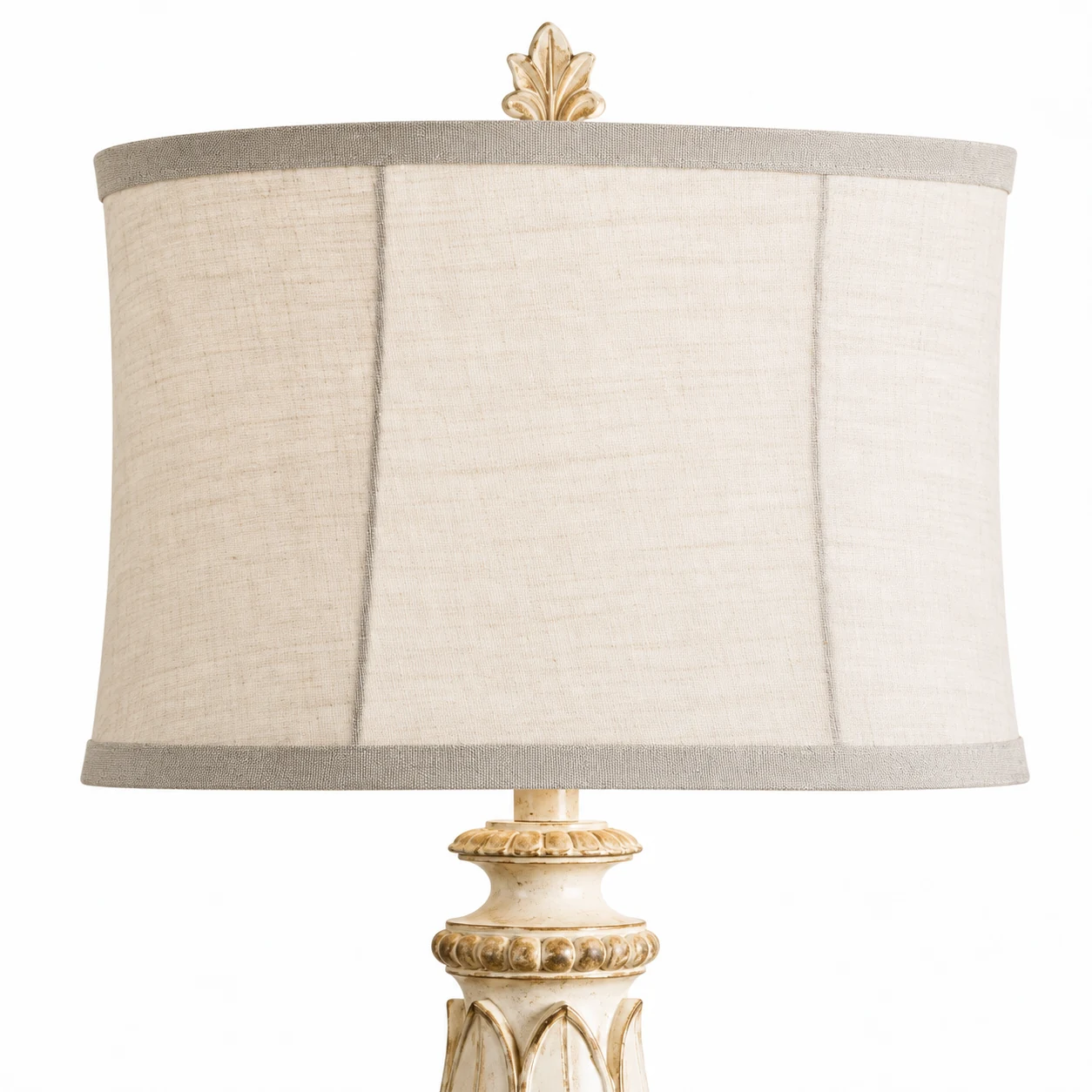 Close detail of the linen shade, gray trim and finial