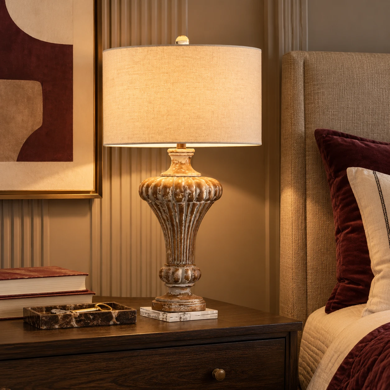 Aurelia carved wood table lamp in a boutique hotel bedroom