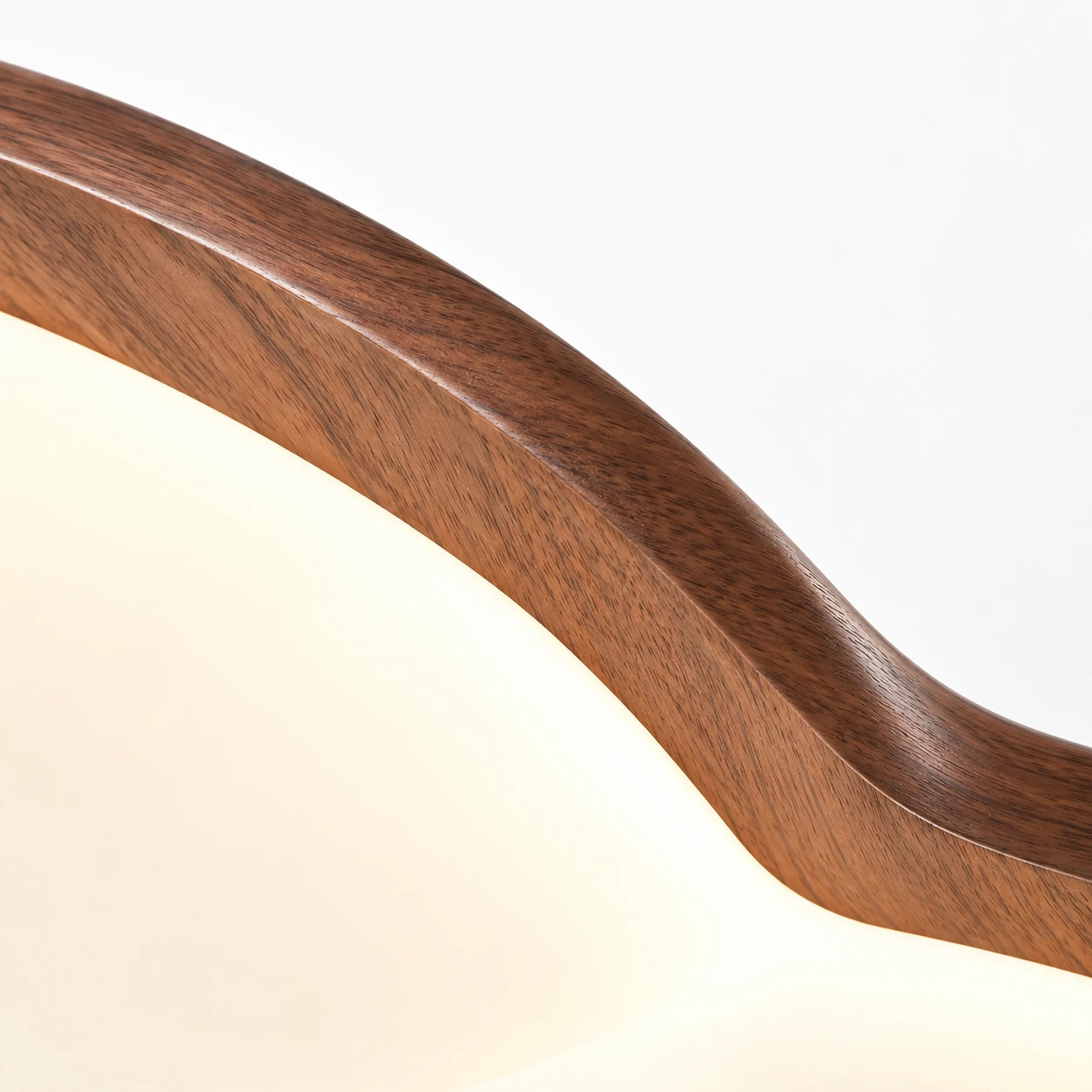 Walnut-finish curved edge and opal diffuser junction