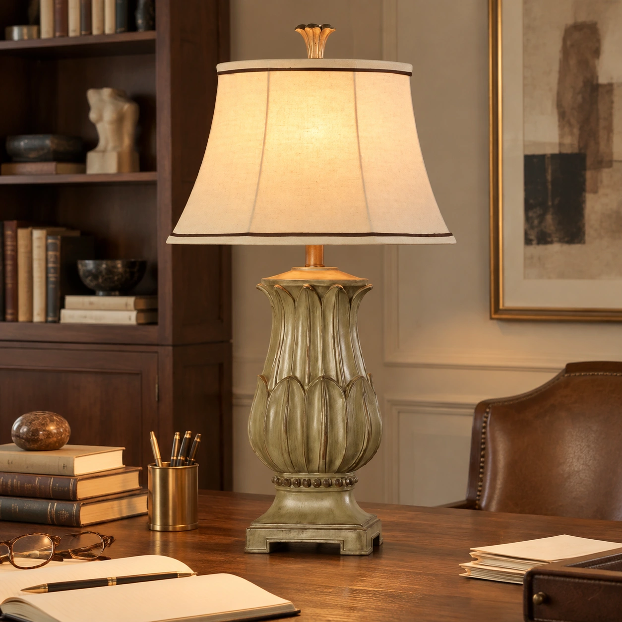 Marlowe carved wood table lamp on a traditional study desk