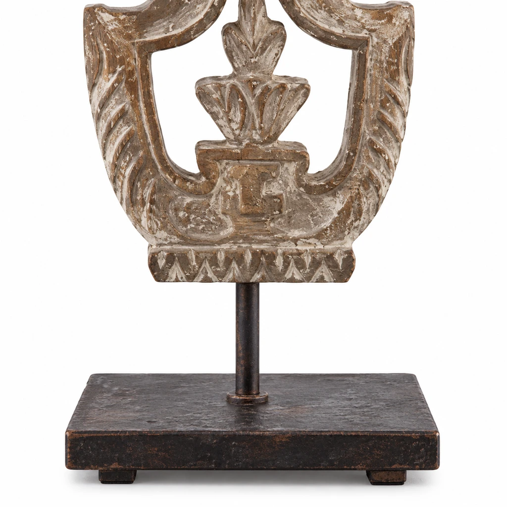 Close detail of the dark architectural lamp base and stem