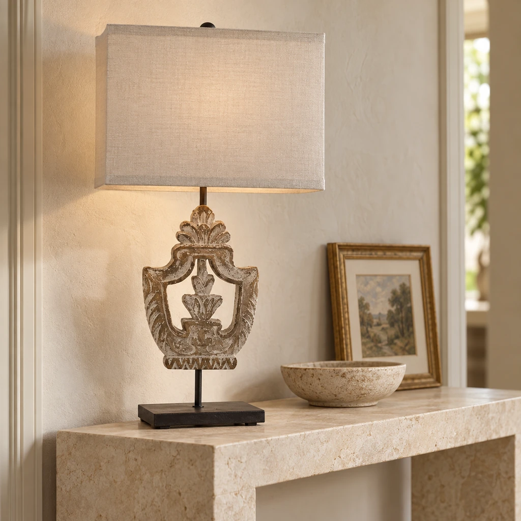 Elodie table lamp on a pale limestone entry console
