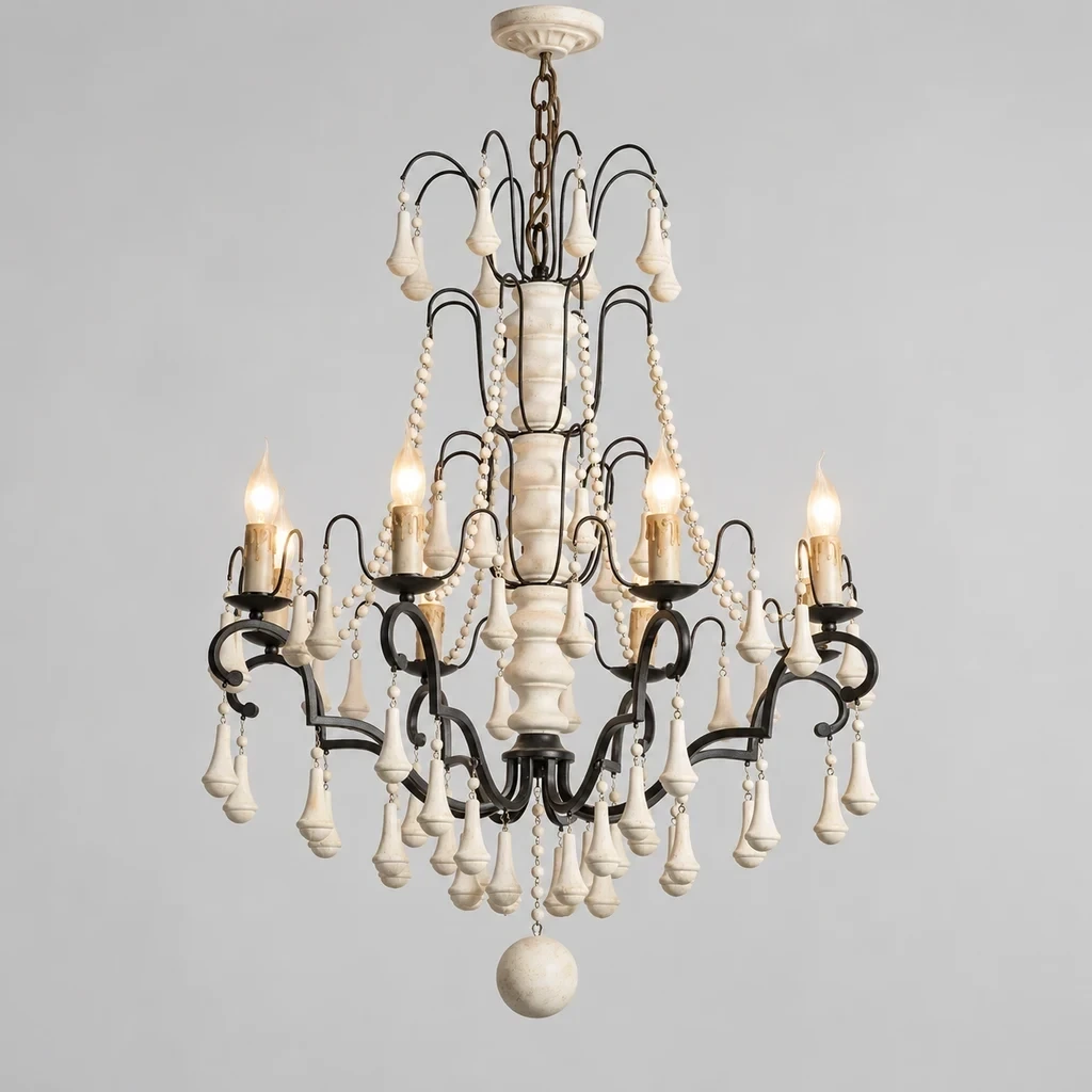 Merritt French Country Beaded Wood Chandelier with Eight Lights switched on in a neutral studio