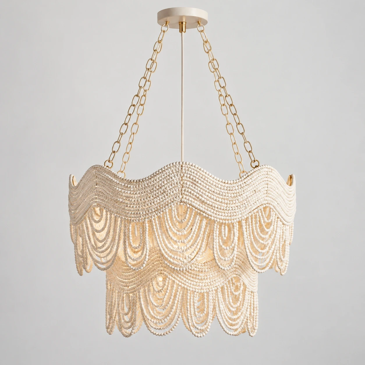 Clara Vintage Minimal Wood and Metal Pendant Light switched on in a neutral studio