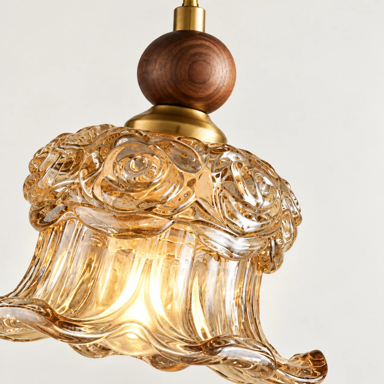Floral glass rim and walnut cap detail