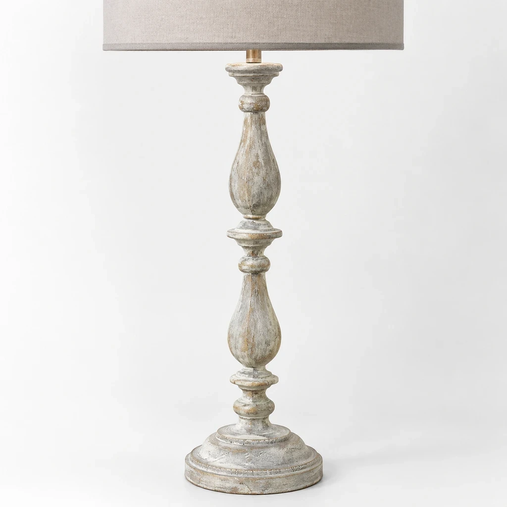 Close detail of the linen shade and turned carved wood pedestal, curved ribs and natural wood