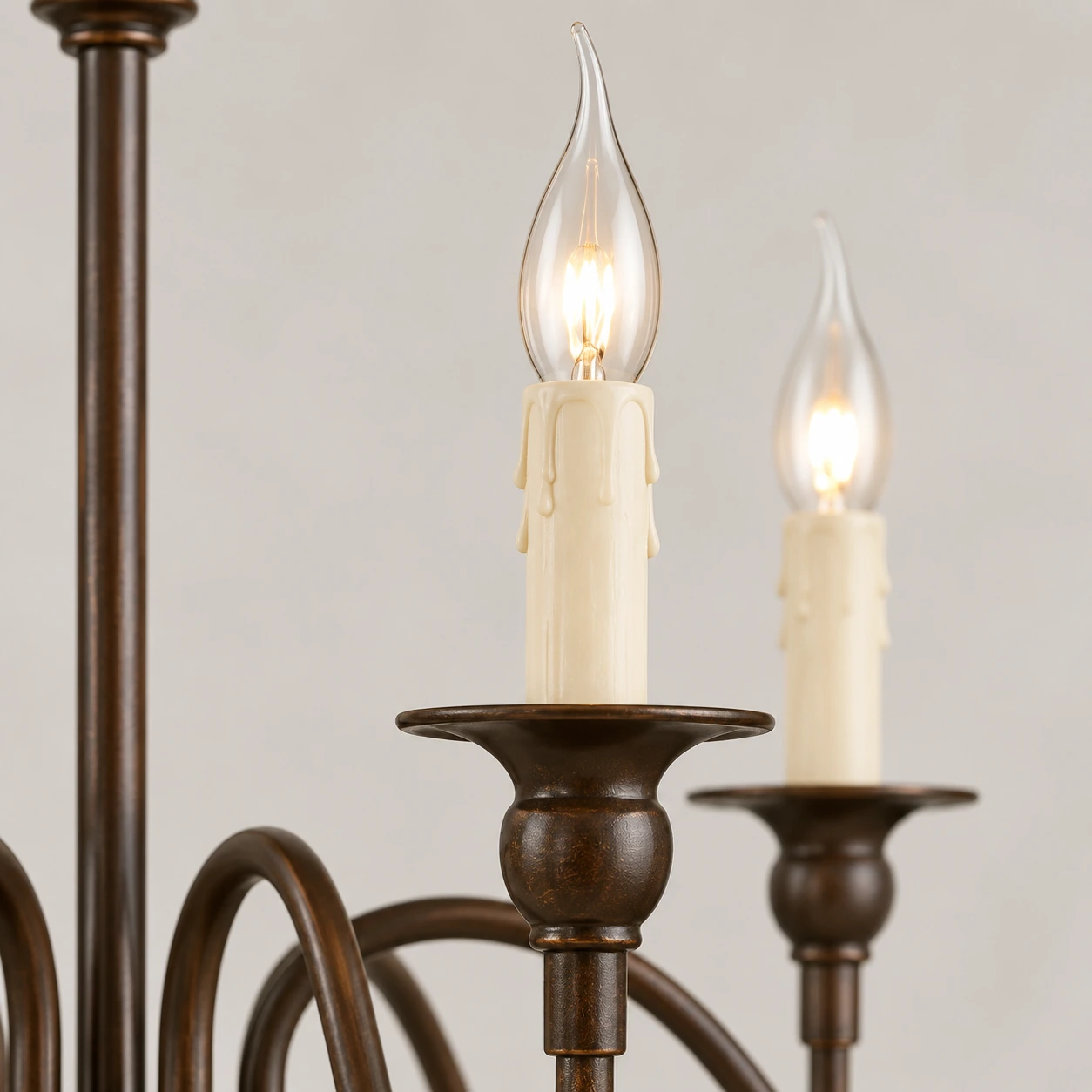 Candle sleeve and iron drip cup detail