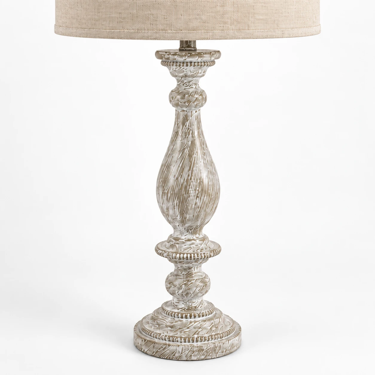 Close detail of the Camille carved wood lamp base