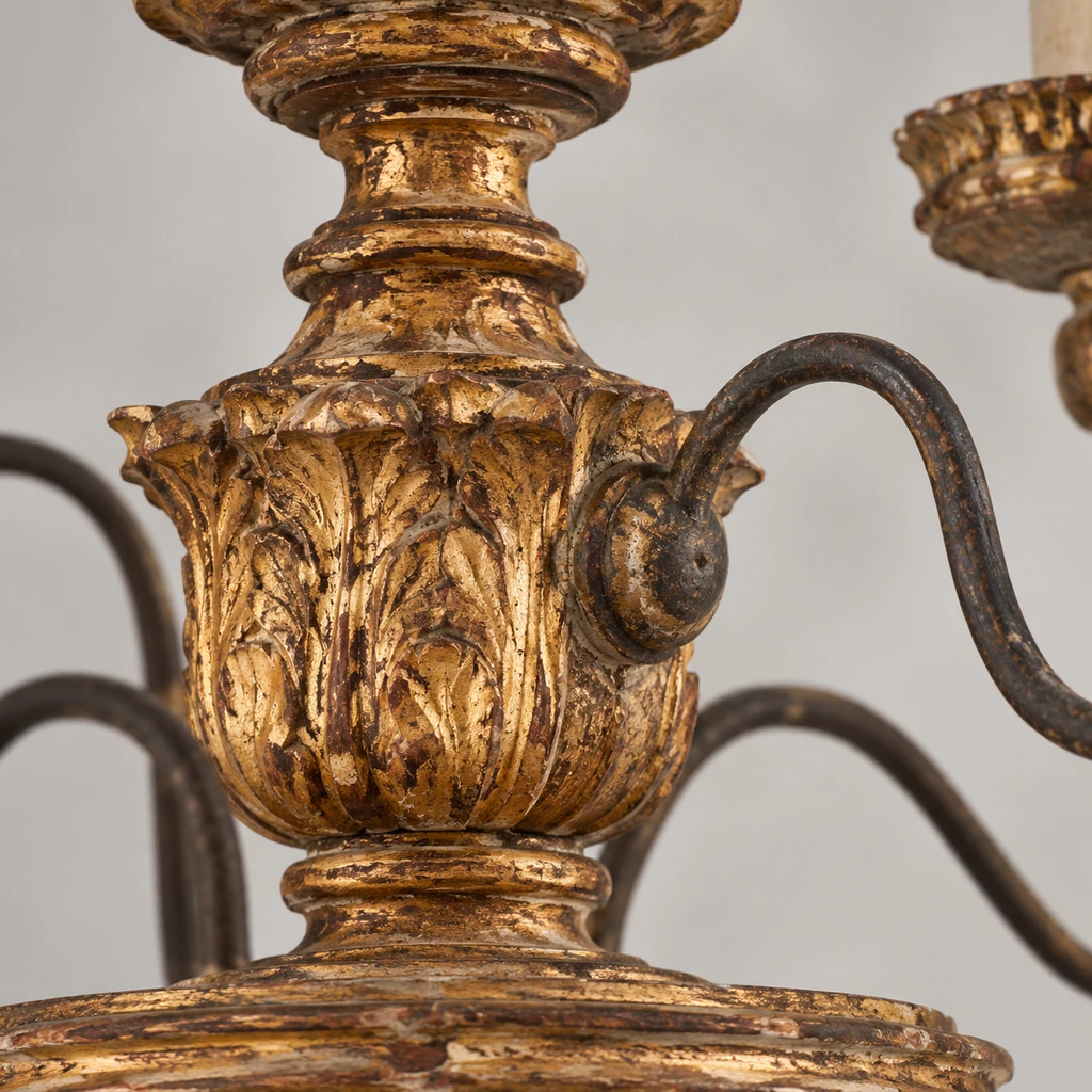Close detail of Marlowe carved wood and distressed gold-leaf relief