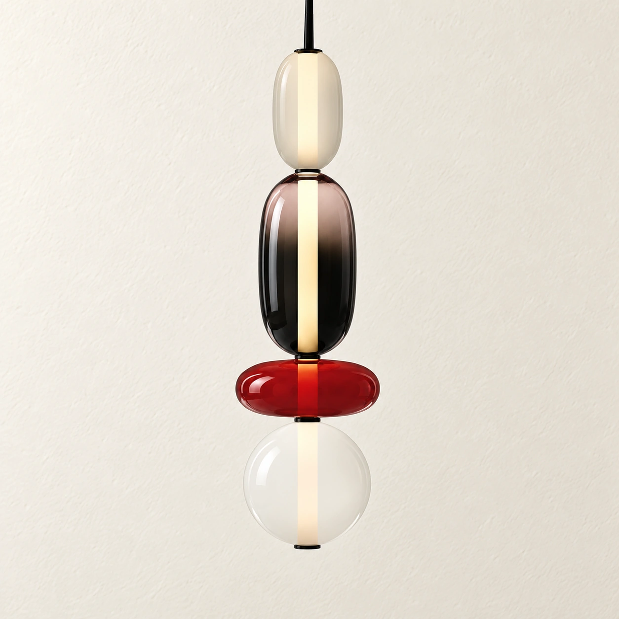 Vesa Red Design G close-up on ivory wall