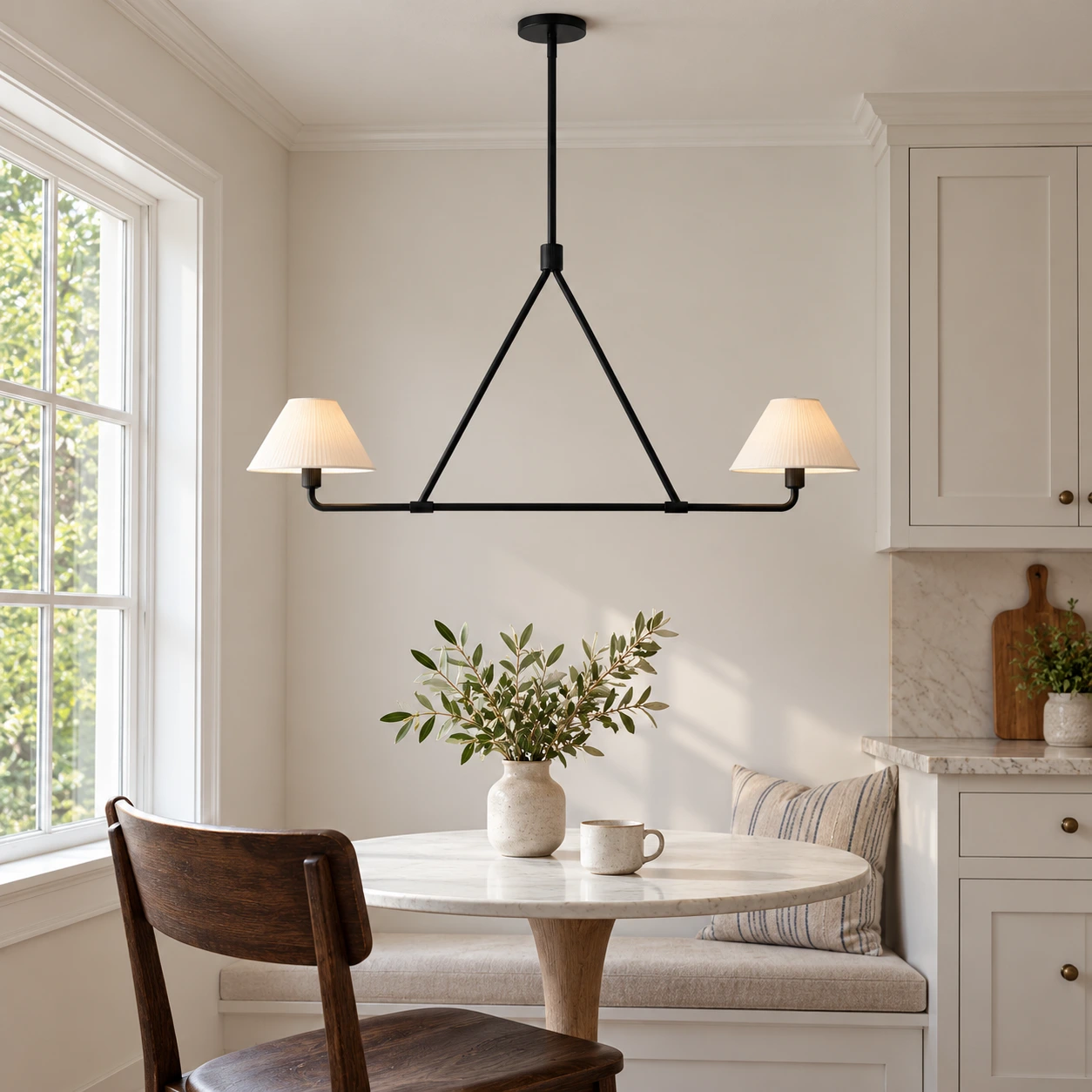 2-Light Black linear chandelier over a breakfast table