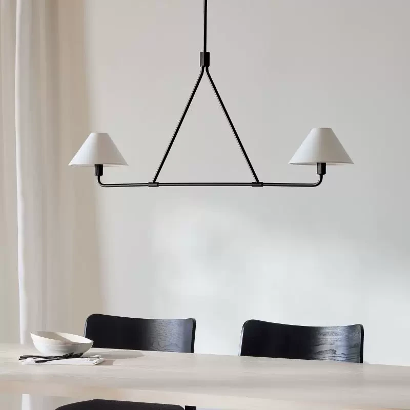 2-Light Black linear chandelier over a small dining table
