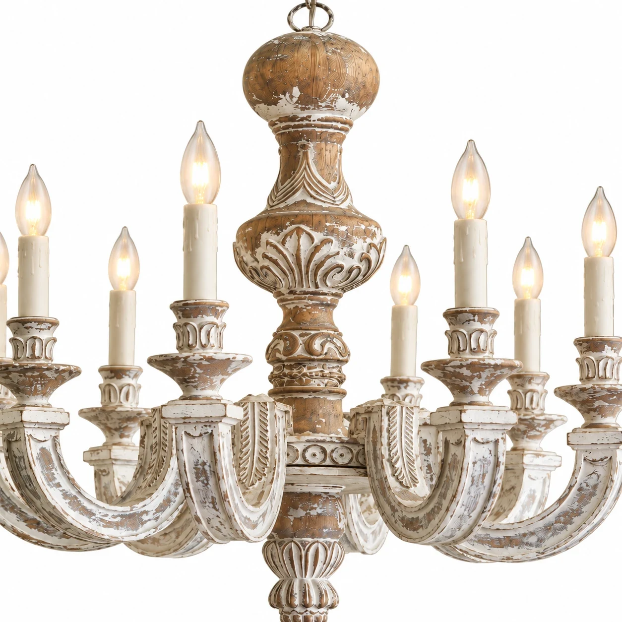 Close view of the carved wood center on the Elowen chandelier